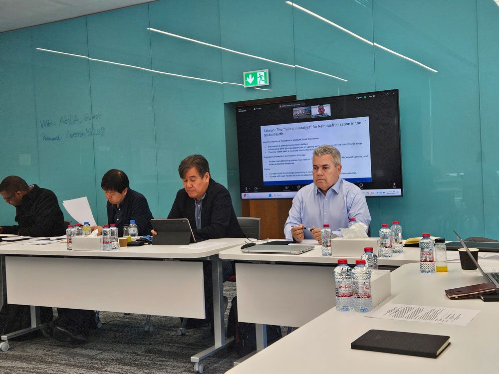 Participant presenting on technology cooperation in Abu Dhabi